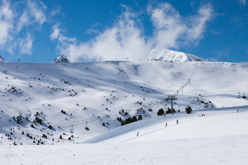blue sky and fresh snow with 3 ski lifts in soldeu ski resort